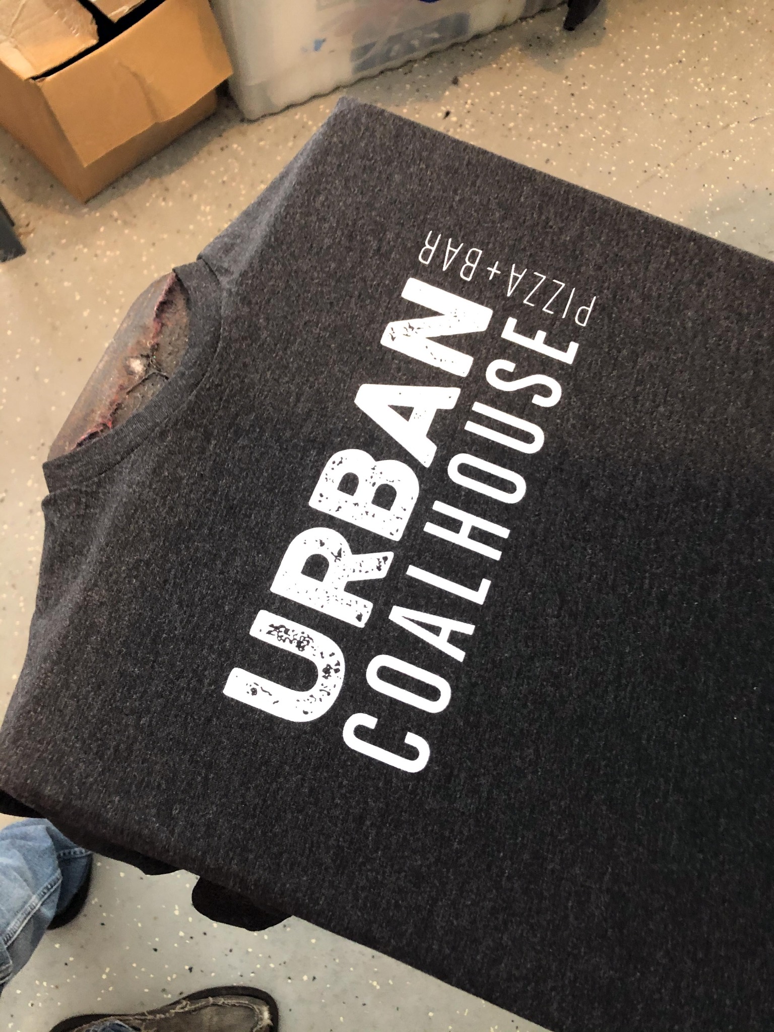 White Urban Coalhouse Pizza + Bar logo printed on a dark heather shirt